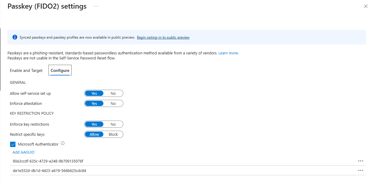 Entra portal showing Passkey (FIDO2) settings with attestation enforcement, key restrictions, Microsoft Authenticator AAGUIDs, and the opt-in banner for passkey profiles preview